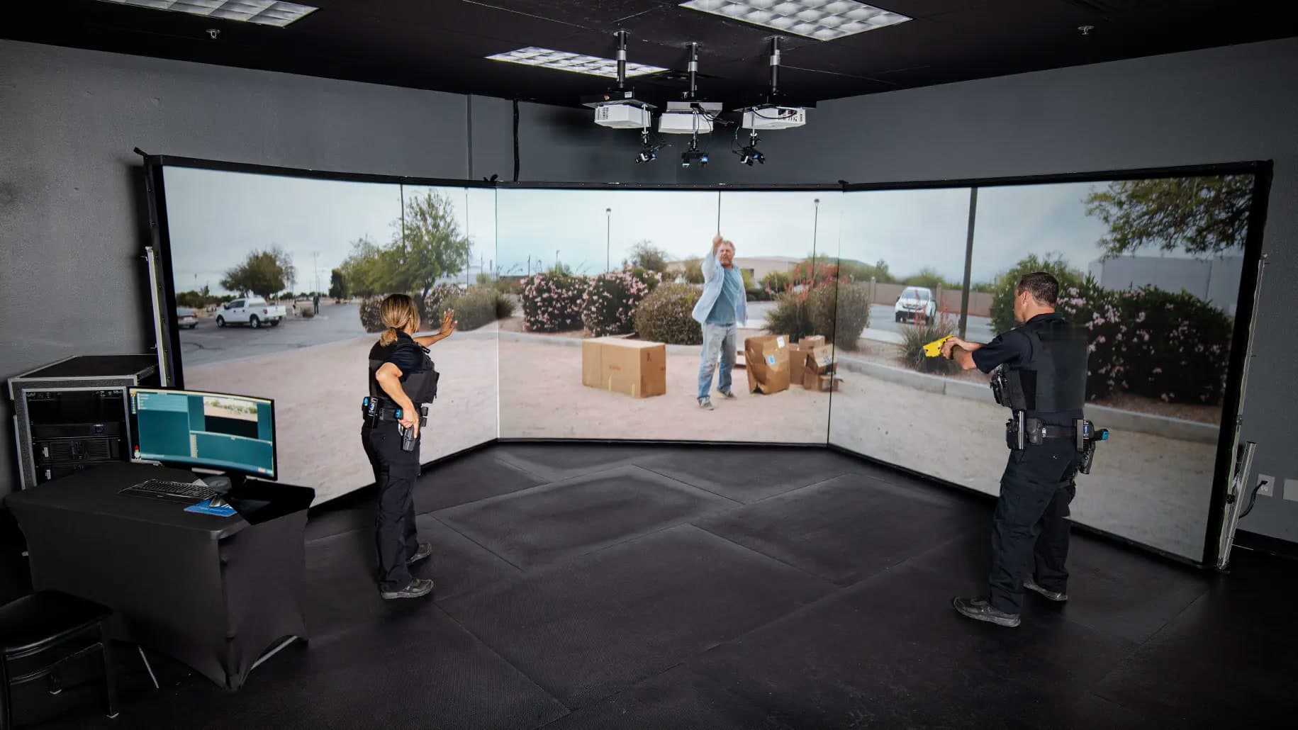 Officer training de-escalation with a less-lethal tool on the firearms simulator
