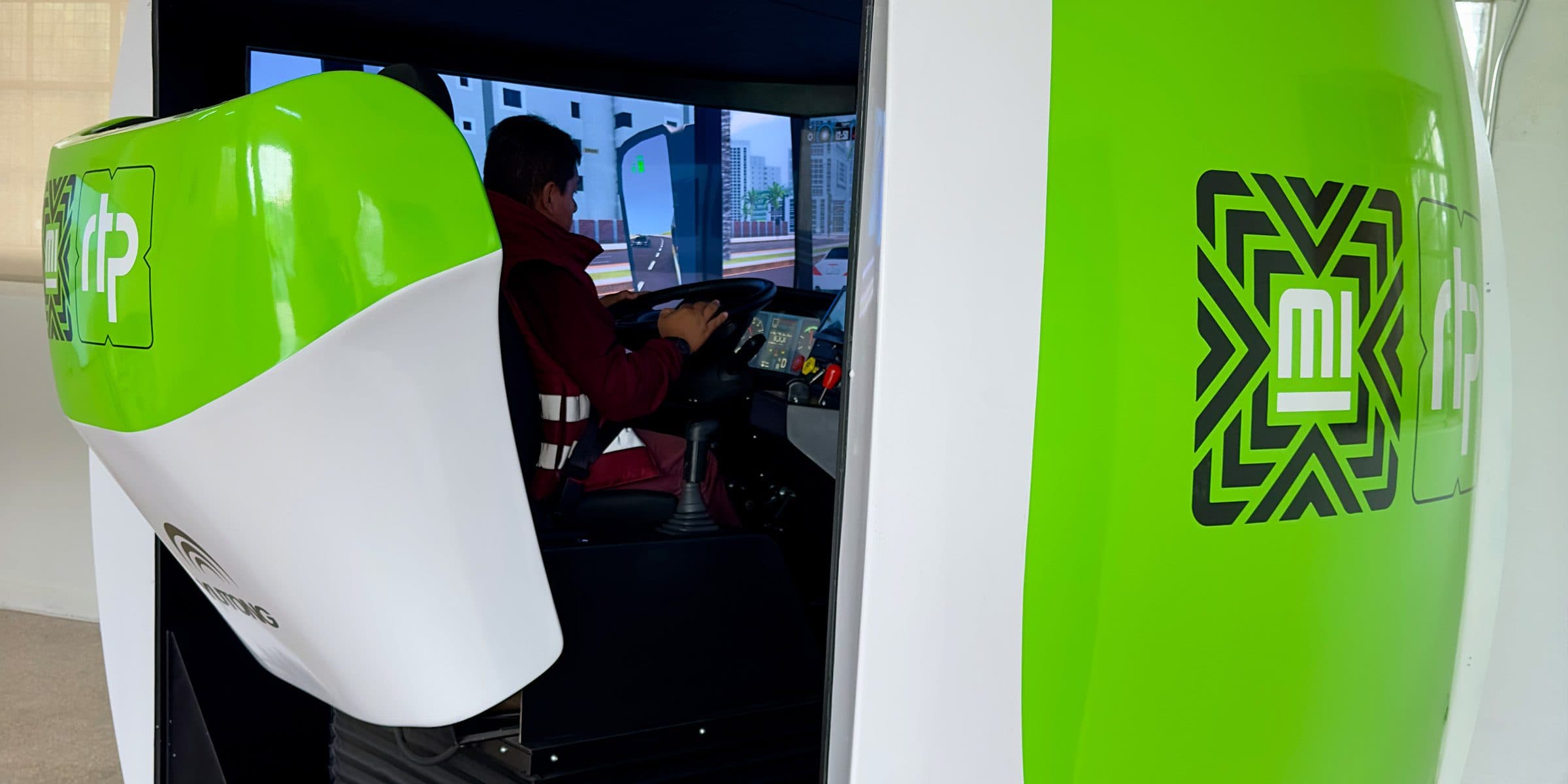 Total-immersion cab of the APEX bus simulator with real controls
