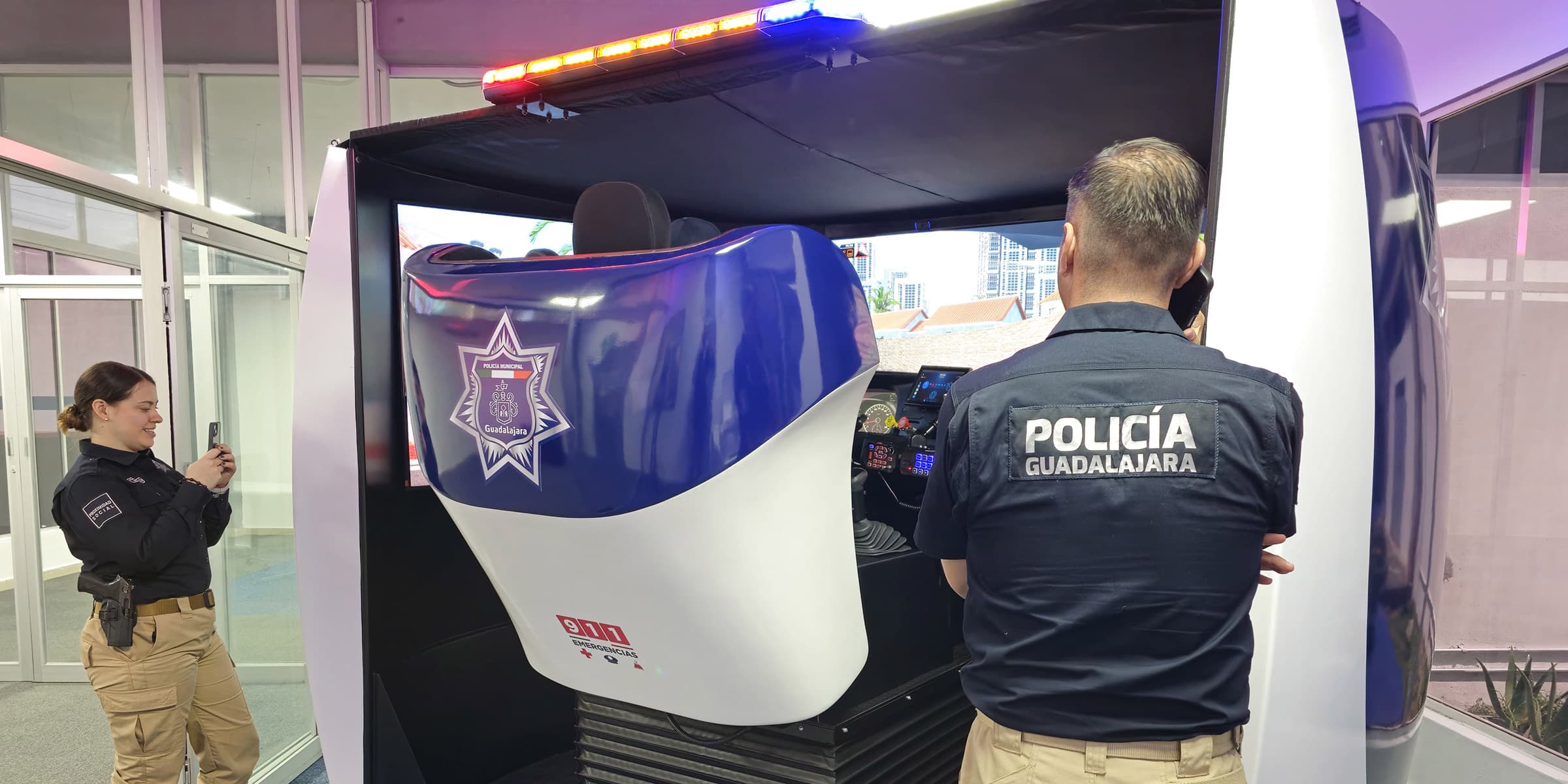 Cab of the APEX patrol simulator with radio, light bar, and real controls