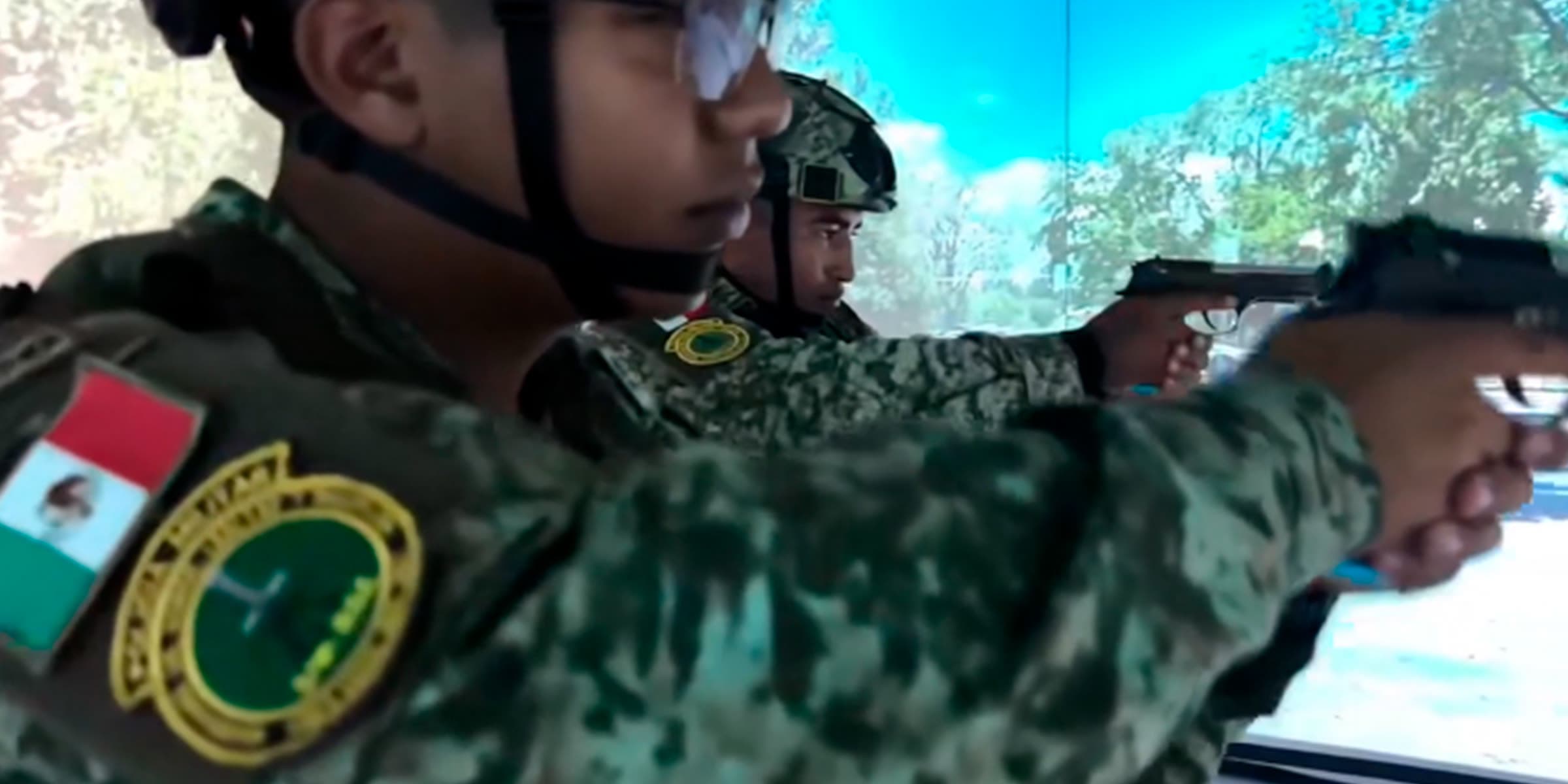 Duty weapon with recoil kit for the firearms training simulator